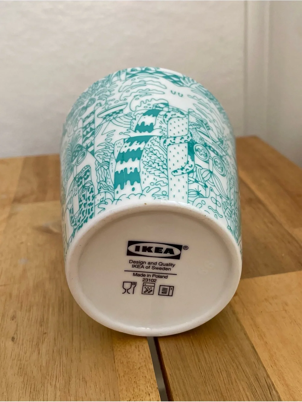 IKEA Ceramic Mug with Teal Tropical Line-Art